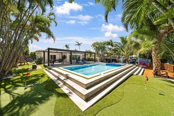 Lakefront 4BR Heated Pool · Hot Tub, Sauna, Games - Image 1